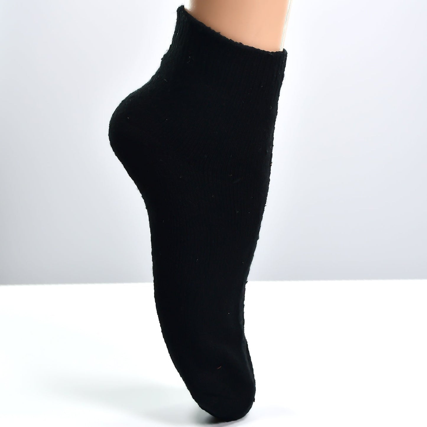 Pair of mixed socks for adults, assorted colors.