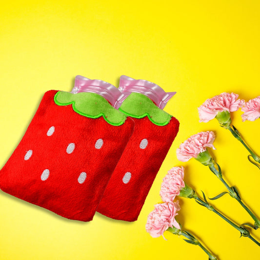 Mini hot water bag with strawberry design for neck and shoulder pain.